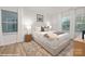 This bedroom features a comfortable bed, soft carpet, and plenty of natural light from the two windows at 48 Sherwood Nw Ct # Sw48, Concord, NC 28027