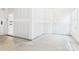 Unfinished two-car garage with room for cars and storage, with door to inside the home at 48 Sherwood Nw Ct # Sw48, Concord, NC 28027
