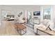 Bright living room with stylish decor and seating with view into main bedroom through entryway at 48 Sherwood Nw Ct # Sw48, Concord, NC 28027