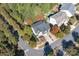 Aerial view of a lovely home with mature trees and landscaping showcasing the property's curb appeal and neighborhood setting at 507 Quicksilver Trl, Fort Mill, SC 29708