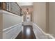 Inviting hallway features hardwood floors, wainscoting, and stylish lighting at 507 Quicksilver Trl, Fort Mill, SC 29708