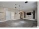 Living room with black hardwood flooring, recessed lighting and a television at 507 Quicksilver Trl, Fort Mill, SC 29708