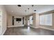 Living room with black hardwood flooring, recessed lighting and a television at 507 Quicksilver Trl, Fort Mill, SC 29708