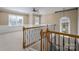 Neutral-colored loft space featuring wainscoting and a large window at 507 Quicksilver Trl, Fort Mill, SC 29708