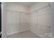 Walk-in closet with installed shelving for optimal storage at 507 Quicksilver Trl, Fort Mill, SC 29708