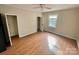 Simple bedroom with hardwood floors and closet at 807 Phillips Dr, Kings Mountain, NC 28086