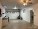 Unfinished basement with wood stove and sink at 2022 Friendship Church Rd, Taylorsville, NC 28681