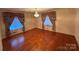 Bright bedroom with hardwood floors and chandelier at 2022 Friendship Church Rd, Taylorsville, NC 28681