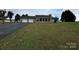 Ranch style home with stone exterior and large yard at 2022 Friendship Church Rd, Taylorsville, NC 28681