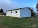 White metal building with single door and windows at 2022 Friendship Church Rd, Taylorsville, NC 28681