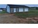 Spacious two-car garage with workshop area at 2022 Friendship Church Rd, Taylorsville, NC 28681