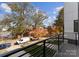 Balcony view of tree-lined street and neighborhood at 217 Keswick Ave, Charlotte, NC 28206