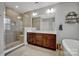 Elegant bathroom with double vanity and walk-in shower at 376 Delburg St, Davidson, NC 28036