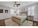 Spacious bedroom with wood floors and large windows at 376 Delburg St, Davidson, NC 28036