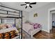 Bedroom featuring bunk beds and a full-size bed at 376 Delburg St, Davidson, NC 28036