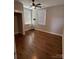 Bedroom with hardwood floors, ceiling fan, and window blinds at 376 Delburg St, Davidson, NC 28036