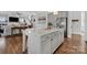 Kitchen island with granite countertops and seating for four at 376 Delburg St, Davidson, NC 28036