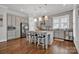 Modern kitchen with gray cabinets, granite countertops, and an island at 376 Delburg St, Davidson, NC 28036