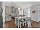 Modern kitchen with gray cabinets, granite countertops, and an island at 376 Delburg St, Davidson, NC 28036