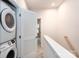 Convenient laundry closet with stackable washer and dryer at 412 Tristram Ln, Charlotte, NC 28205