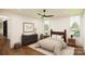 Cozy bedroom with hardwood floors and a neutral color palette at 1935 Weddington Rd # A, Matthews, NC 28105