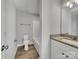 Clean bathroom with a bathtub, granite vanity, and modern fixtures at 305 Gooch St, Lancaster, SC 29720