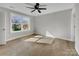 Bright bedroom with hardwood floors and a large window at 305 Gooch St, Lancaster, SC 29720