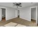 Well-lit bedroom featuring hardwood floors and ample closet space at 305 Gooch St, Lancaster, SC 29720