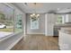 Bright dining area with hardwood floors and large window at 305 Gooch St, Lancaster, SC 29720