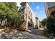 Brick building exterior with parking and city views at 708 N Davidson St, Charlotte, NC 28202