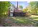 Spacious backyard with a large deck and patio at 128 Archbell Point Ln, Mooresville, NC 28117