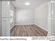Versatile flex space featuring smooth walls, baseboards, and natural light from large windows at 209 Lake George Dr, Shelby, NC 28152