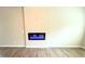 Bright living room with hard floors and a black fireplace at 209 Lake George Dr, Shelby, NC 28152