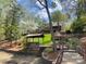 Backyard leading to the waterfront, showcasing a gazebo and lush greenery at 377 Riverwood Rd, Mooresville, NC 28117