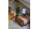 Bedroom featuring an ornate dresser, sloped ceiling, and a comfortable bed at 377 Riverwood Rd, Mooresville, NC 28117