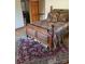 Comfortable bedroom featuring a wooden frame bed on an ornate rug at 377 Riverwood Rd, Mooresville, NC 28117