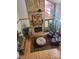 Open living space with a floor-to-ceiling fireplace, hardwood floors, and natural light at 377 Riverwood Rd, Mooresville, NC 28117