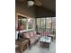 Relaxing screened porch with comfortable seating and scenic views at 377 Riverwood Rd, Mooresville, NC 28117