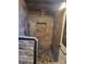 Luxurious walk-in shower with stone tile and a pebble floor at 377 Riverwood Rd, Mooresville, NC 28117