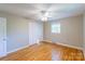 The bedroom has hardwood floors, a ceiling fan, a double-door closet, and a window at 349 Dublin Ct, Gastonia, NC 28054