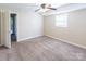 This bedroom is bright with a window and neutral walls and plush carpeting at 349 Dublin Ct, Gastonia, NC 28054