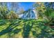 Exterior of a two-story house with classic architectural details surrounded by mature trees at 349 Dublin Ct, Gastonia, NC 28054