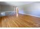 This spacious living room boasts hardwood floors and a staircase leading to a second floor at 349 Dublin Ct, Gastonia, NC 28054