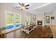 Elegant dining room with a farmhouse table and built-in shelving at 357 China Grove Rd, Kannapolis, NC 28083