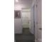 View of the bathroom showing the stylish Savon Douce shower curtain and dark wood flooring at 4986 6Th Sw St, Catawba, NC 28609