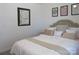 Bedroom with soft bedding, a decorative headboard, and unique framed artwork at 4986 6Th Sw St, Catawba, NC 28609