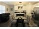 Modern dining area with stylish table, chairs, and direct view of the kitchen at 4986 6Th Sw St, Catawba, NC 28609