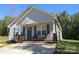 Charming single-story home with a covered front porch and manicured lawn, offering curb appeal and a welcoming entrance at 4986 6Th Sw St, Catawba, NC 28609