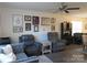 Comfortable living room featuring cozy seating, modern decor, and wood-look flooring at 4986 6Th Sw St, Catawba, NC 28609