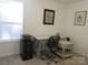 Home office with a neutral desk, comfortable chair, and natural light from a window at 4986 6Th Sw St, Catawba, NC 28609